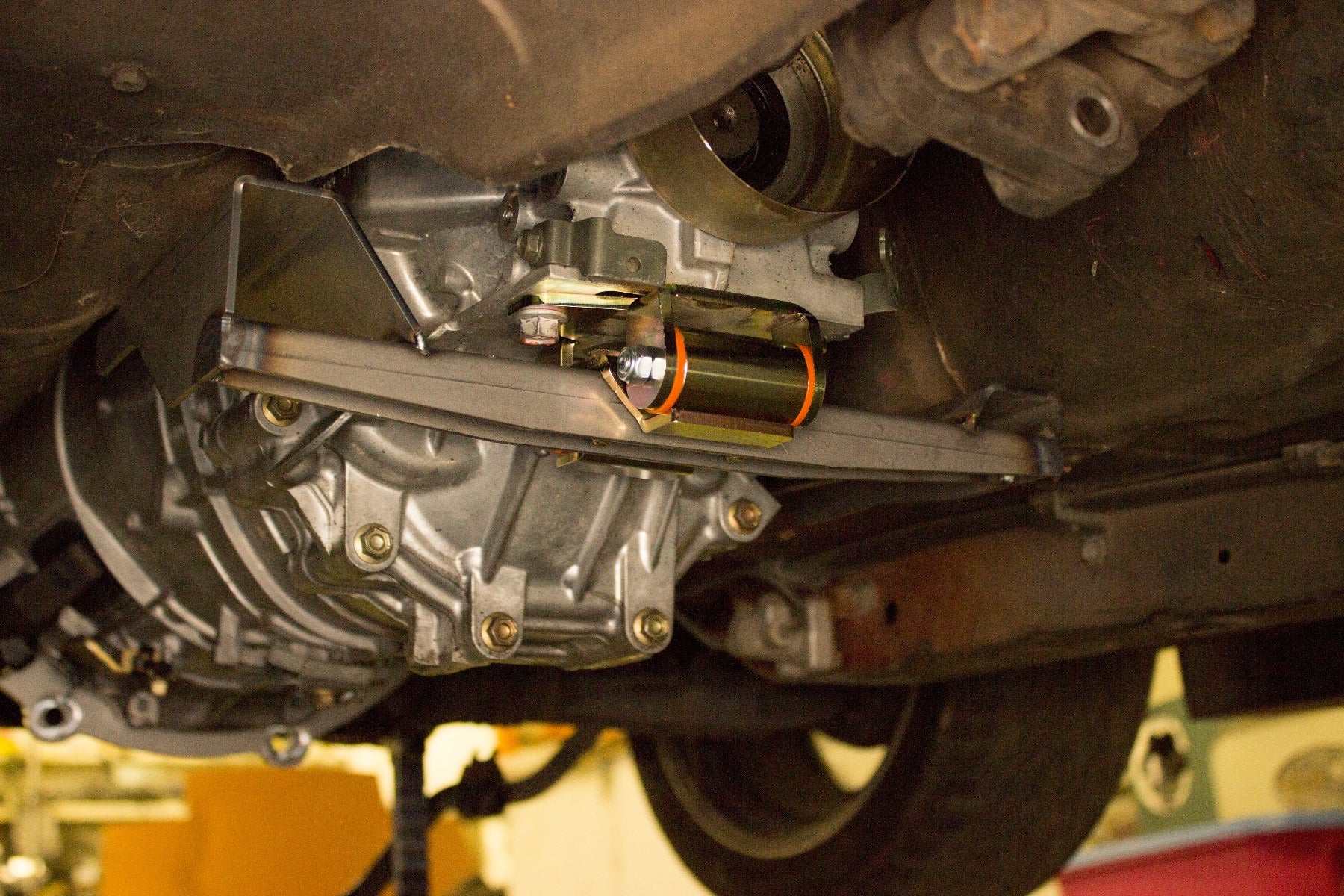 S Chassis to VQ (CD009) Transmission cross member